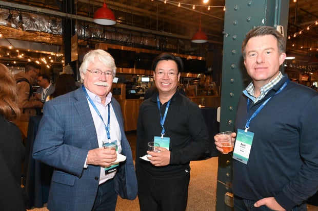 People post for photos at the WTC Greater Philadelphia Global Forum 