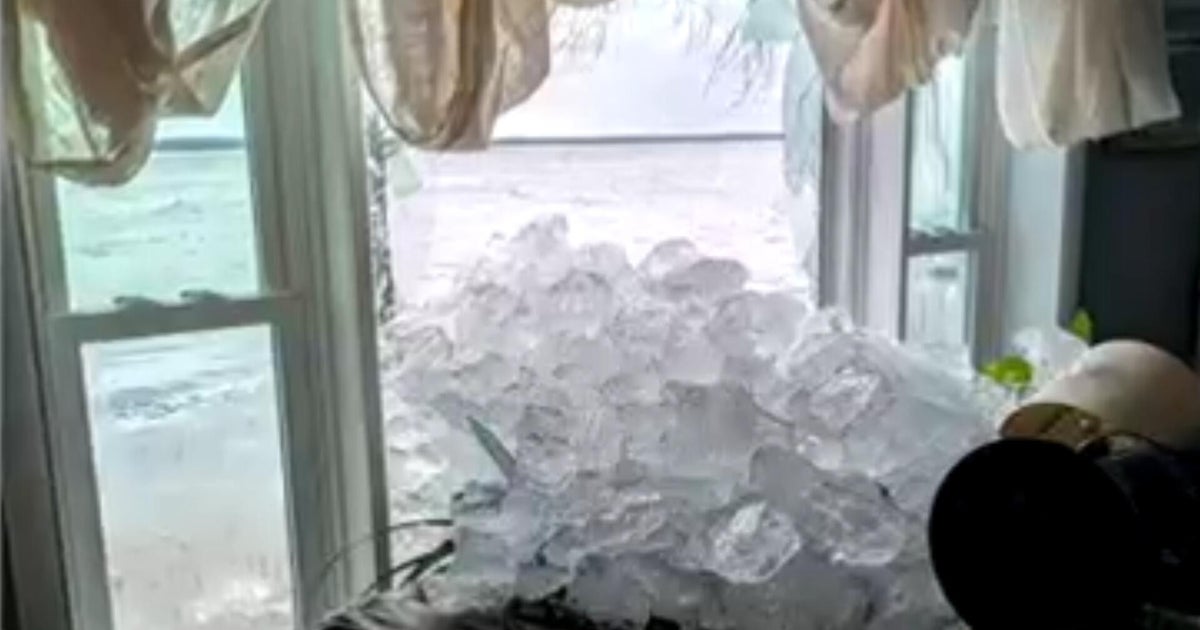 Slow-moving monster storm hammers Michigan, dubbed "ice tsunami"