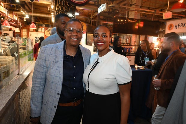 People post for photos at the WTC Greater Philadelphia Global Forum 