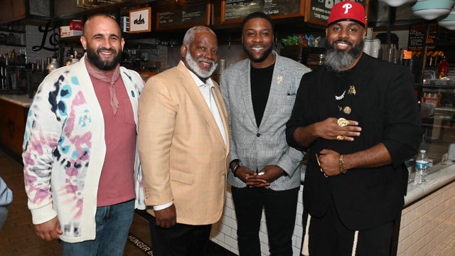 People post for photos at the WTC Greater Philadelphia Global Forum 