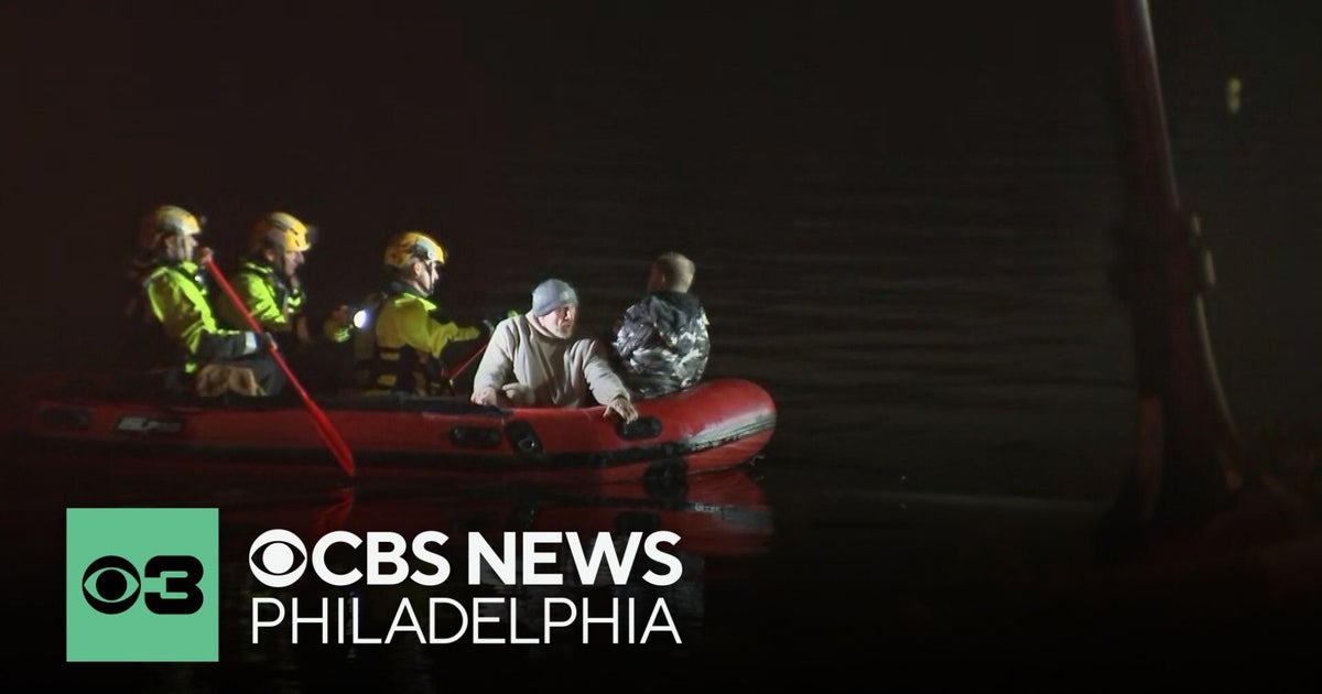 First responders rescue two men after their canoe capsized on the ...