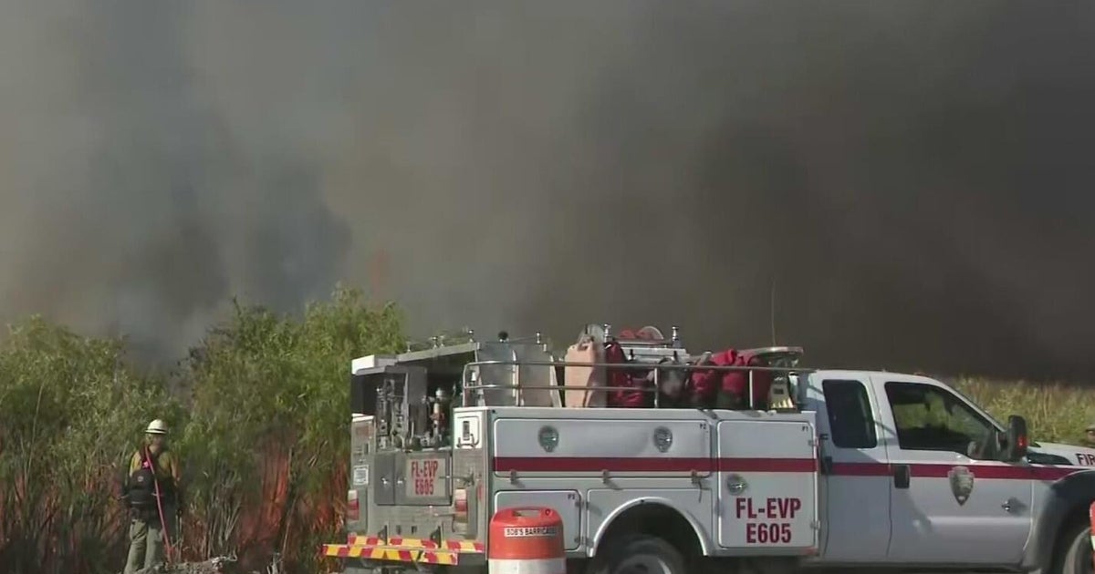 Highway 41 Fire in west Miami-Dade continues to rage as crews work to extinguish flames