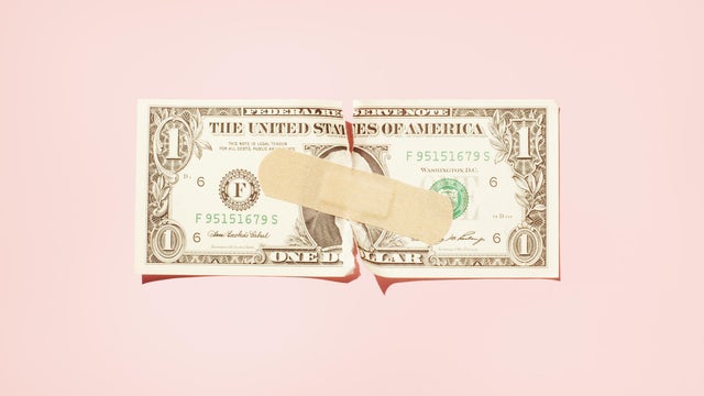 Torn $1 note with plaster. 