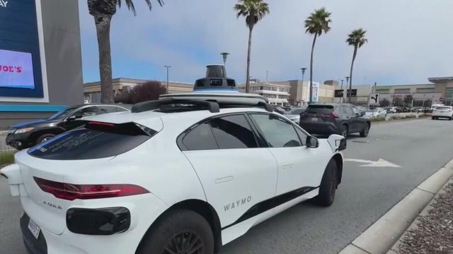 a driverless car on a city road 