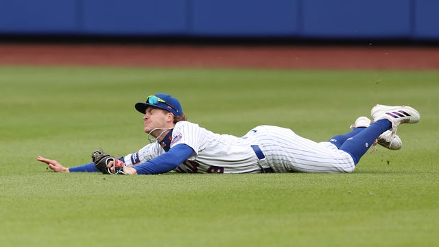 Carson Benge #3 of the New York Mets can't get to the ball during the ninth inning of a game against the Washington Nationals at Citi Field on April 30, 2026 in the Queens borough of New York City. 