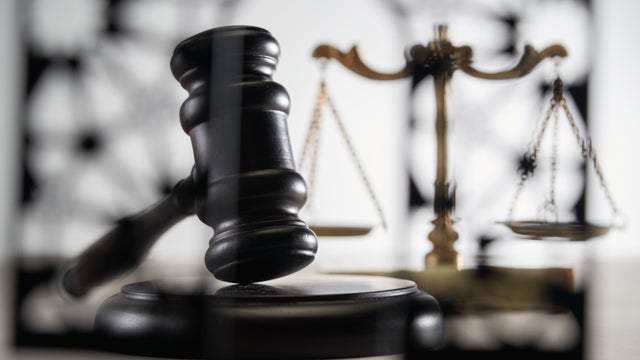 gavel hammer and Islamic and Arabic ornamental background 