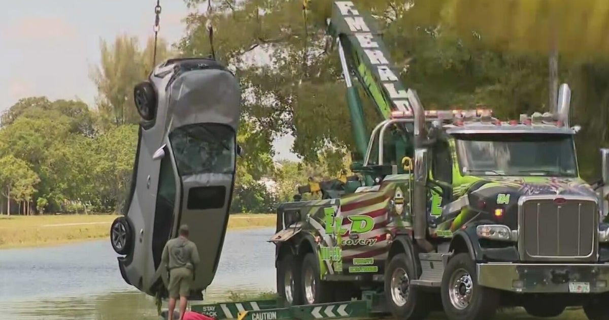 Elderly woman saved by crews after her car plunges into a Pompano Beach canal