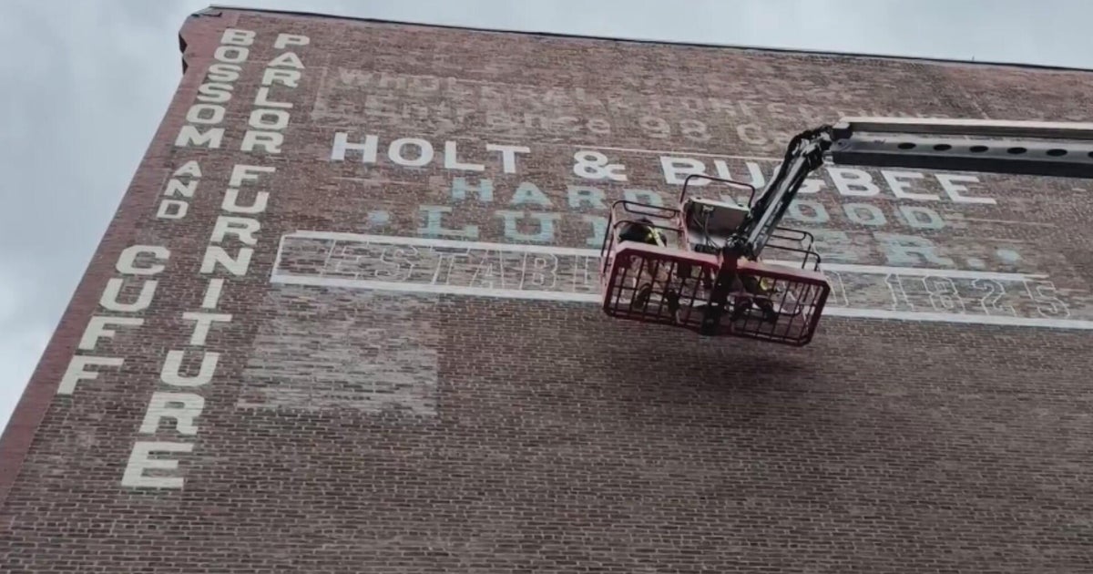 Brothers working to revive Boston's past by repainting so-called "ghost signs"