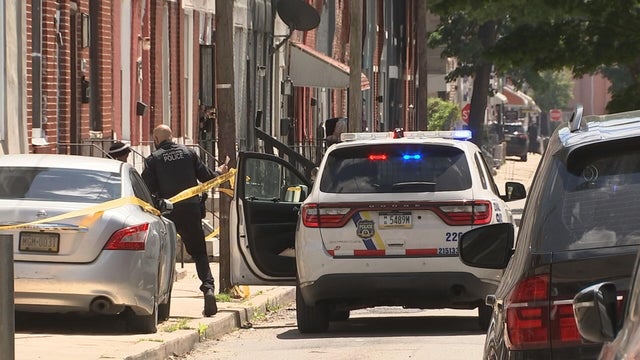 Generic police lights and yellow police tape at crime scene 