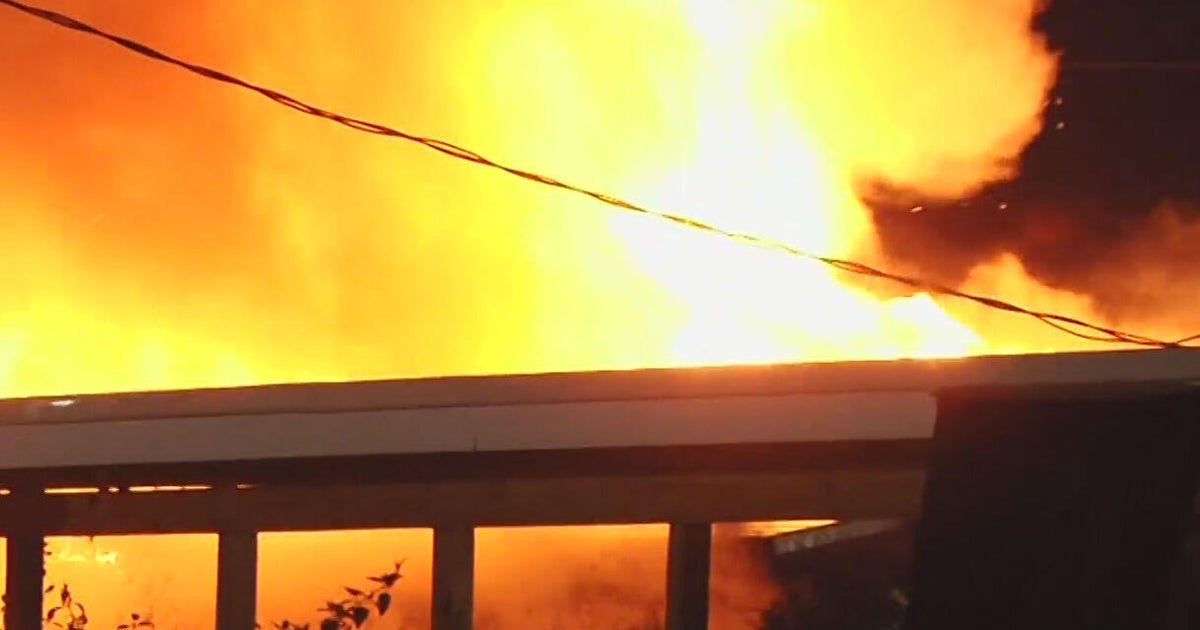 Massive fire destroys Broward home early Tuesday morning, officials say