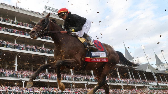Golden Tempo, ridden by jockey Jose Ortiz, runs in the Kentucky Derby at Churchill Downs, May 2, 2026, in Louisville, Kentucky. 