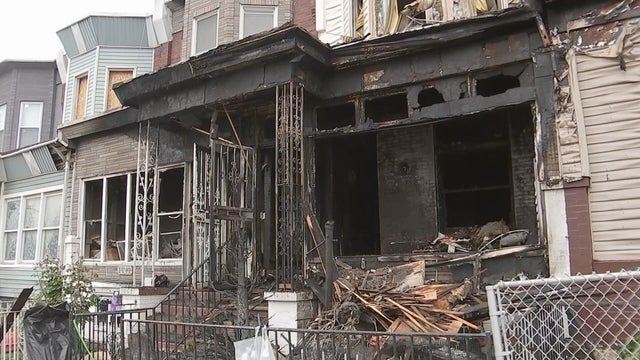 Exterior photo of a Southwest Philadelphia home severely damaged in a fire 