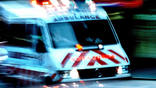 An ambulance on the way to the scene of an accident in Sydney on 20 July 2002. 