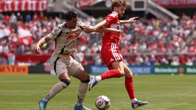 Anton Sal&eacute;tros #6 of Chicago Fire FC flicks the ball past Cade Cowell #7 of the Red Bull New York during the first half at Soldier Field on May 9, 2026 in Chicago, Illinois. 