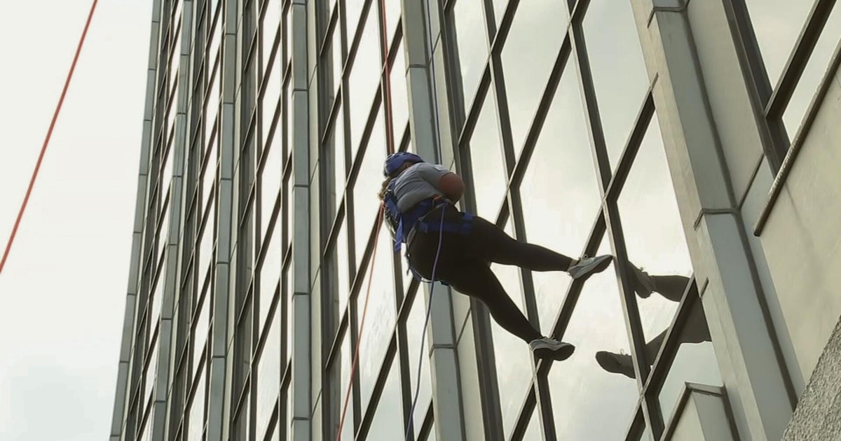 Dozens rappel down building to raise money for Special Olympics Delaware