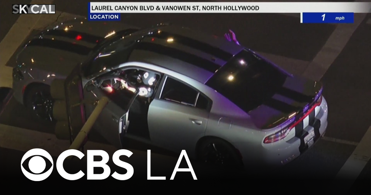 Possibly armed suspect surrenders after leading LAPD officers on ...