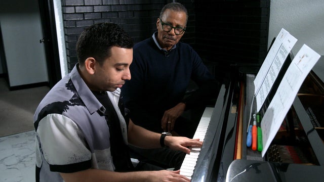 Payam Khastkhodaei  and Bill Whitaker 