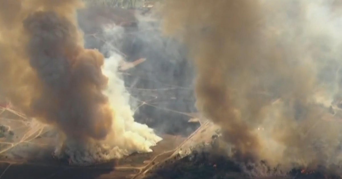 Relentless wind-fueled wildfires burn across Southern California