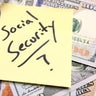 American cash money and yellow paper note Social Security with question mark 