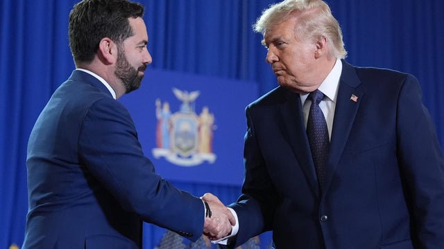 President Donald Trump shakes hands with Rep. Mike Lawler, R-N.Y., at Rockland Community College, Friday, May 22, 2026, in Suffern, N.Y. 