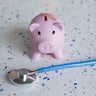 Piggy bank with band-aid 
