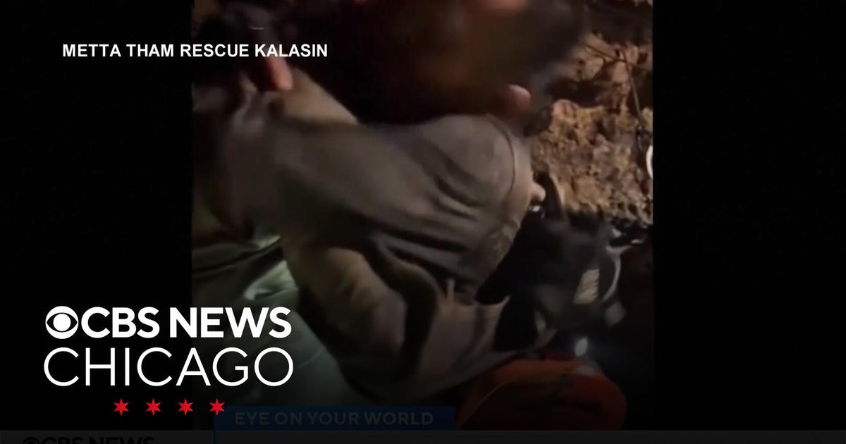 Divers reach 5 trapped villagers in flooded Laos cave; rescuers still working on how to get them out