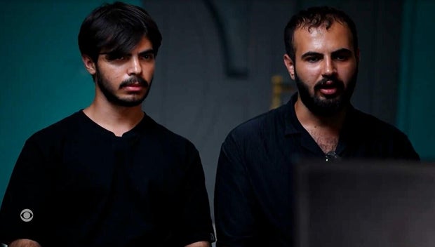 iran-brothers-protesters.jpg