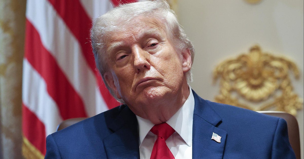 Why did Trump postpone signing an AI executive order?