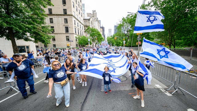 Celebrants march in the Israel Day Parade on Fifth Avenue on May 18, 2025 in New York City. 