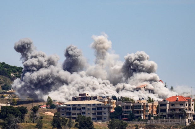 Smoke billows from southern Lebanon, following Israeli strikes, as seen from Nabatieh 