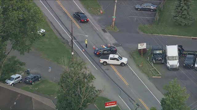 Police vehicles are near the scene of a fatal crash in Bensalem 