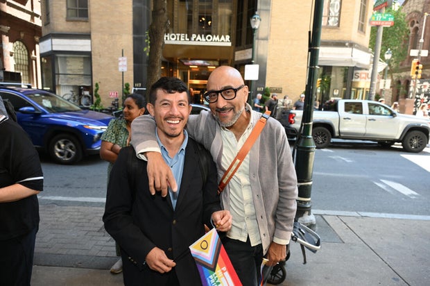 People post for photos at a Pride event at Sofitel Hotel in Philadelphia 