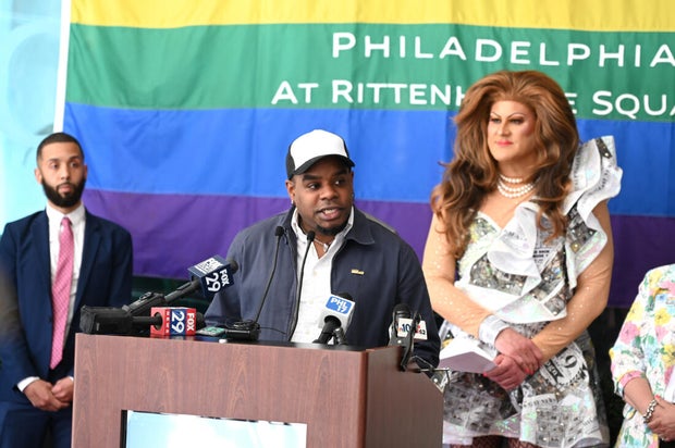 People post for photos at a Pride event at Sofitel Hotel in Philadelphia 