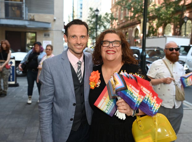 People post for photos at a Pride event at Sofitel Hotel in Philadelphia 