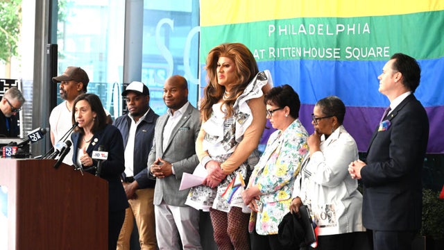 People post for photos at a Pride event at Sofitel Hotel in Philadelphia 