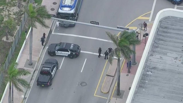 Generic police lights and yellow police tape at crime scene 