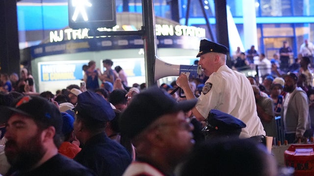 Knicks fans in New York City celebrate after their team's NBA Finals Game 2 win 