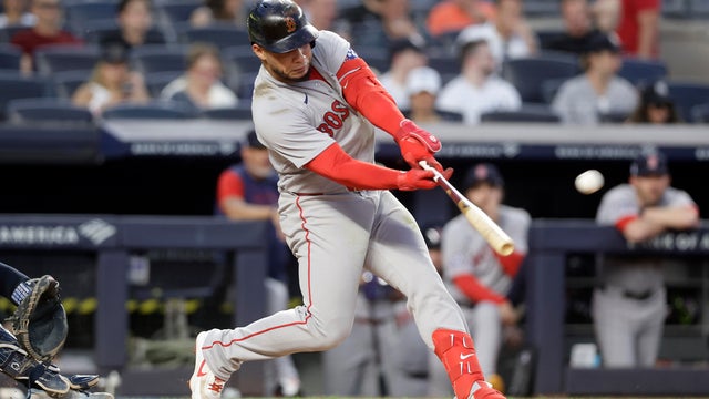 Willson Contreras #40 of the Boston Red Sox hits a two-run home run in the fifth inning against the New York Yankees at Yankee Stadium on June 05, 2026 in New York City. 