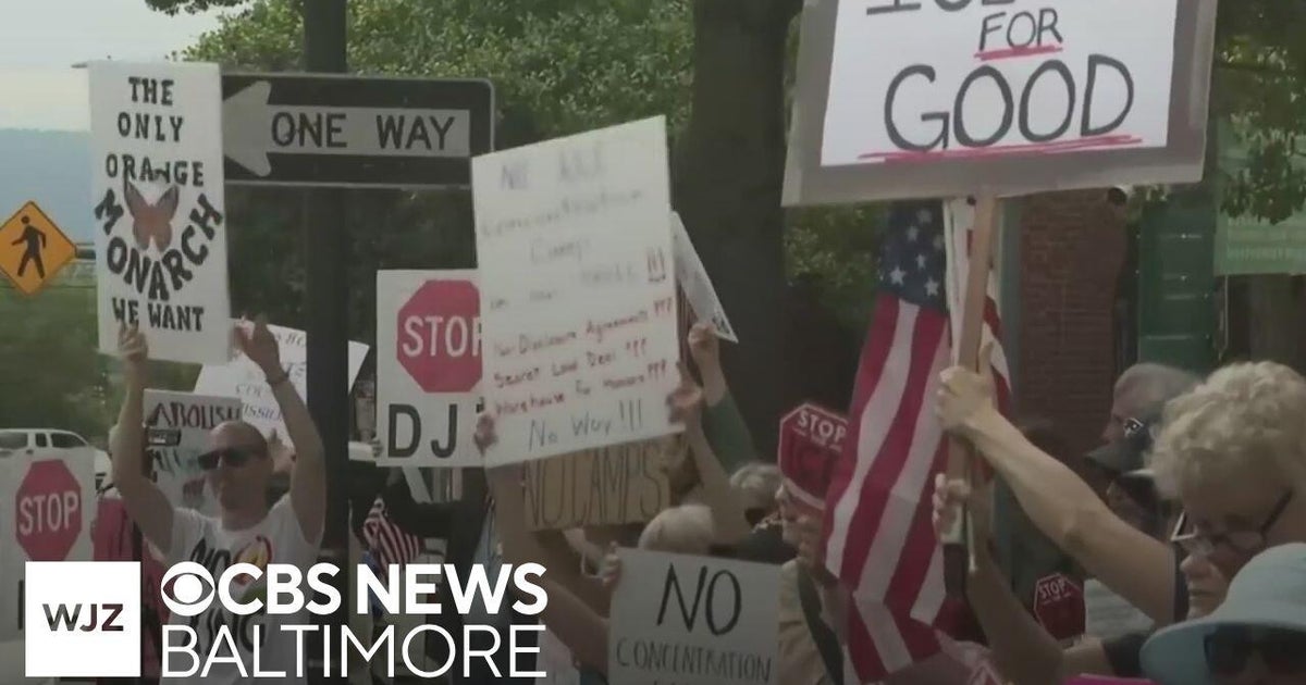 Protestors rally outside hearing over planned ICE detention facility in ...
