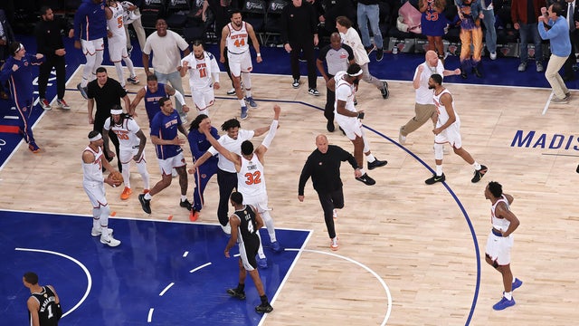 Members of the New York Knicks celebrate their 107-106 victory against the San Antonio Spurs in Game Four of the 2026 NBA Finals at Madison Square Garden on June 10, 2026 in New York City. 