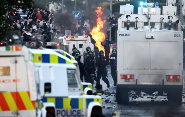 Belfast protests erupt again after stabbing as police deploy water cannons