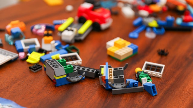 Vibrant, diverse kids' toys like Legos and building blocks spark creativity and learning in children, offering endless play possibilities for imaginative development 