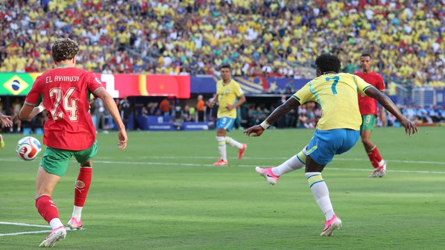 Brazil's Vinicius Junior scores his side's first goal during the FIFA World Cup 2026 Group C match between Brazil and Morocco at New York New Jersey Stadium on June 13, 2026 in East Rutherford, United States. 