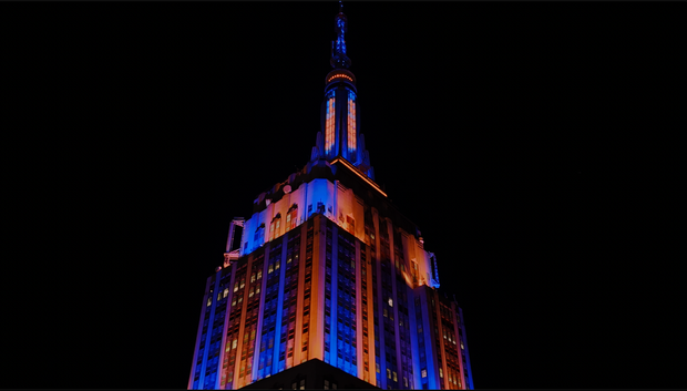 Empire State Building with blue and orange lights