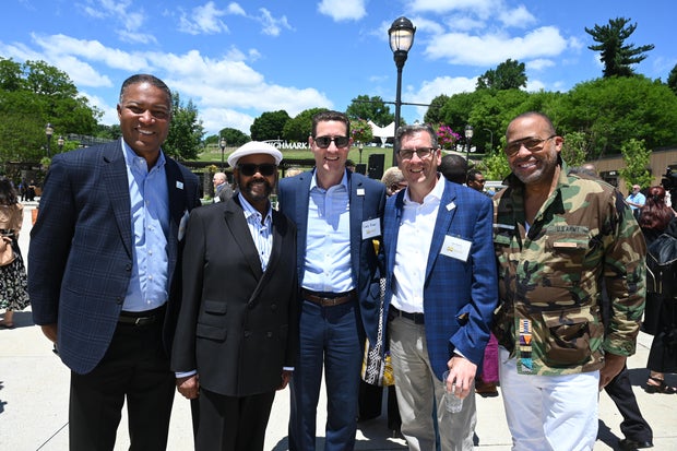 People celebrate the opening of the new Mann Center campus