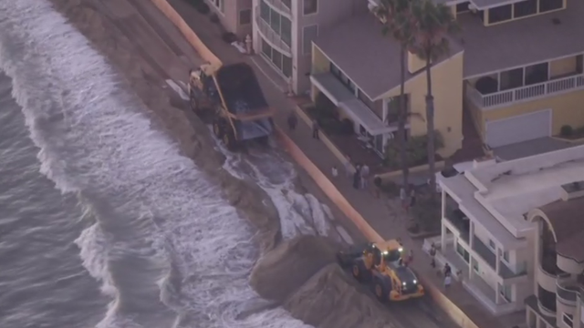 Roadways in the Embarcadero experience some flooding 