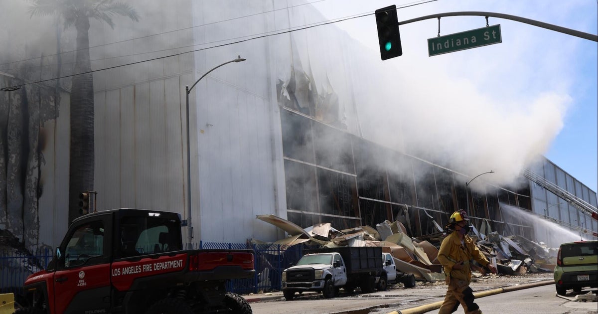 Massive warehouse fire burns for days in LA, prompting environmental and health concerns