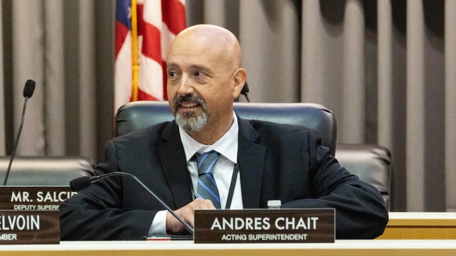 New acting superintendent Andres Chait attends a LAUSD board meeting as a full audience from the Locke high school Greendot charter, which is in danger of not being renewed looks on 