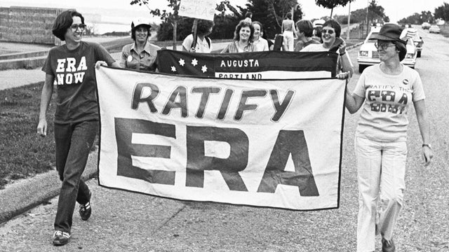 Chris Torracca and Kate McQueen lead Tuesday's (ERA) march. Published Press Herald 8/27/1980 