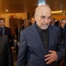 Mohammad Bagher Ghalibaf, right, arrives at the Burgenstock resort in Obburgen, Switzerland, June 21, 2026. 